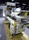 Used Bivans Vertuck Semi Automatic Vertical Cartoner, Model 74G. Capable of speeds up to 120 CPM. Has 6