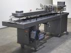 Used- Bivans Vertuck Model 74 Semi Automatic Vertical Cartoner. Capable of speeds up to 120 CPM. Has 6