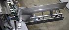 Used Bivans Vertuck Model 74 Semi Automatic Vertical Cartoner. Capable of speeds up to 120 CPM. Has 6
