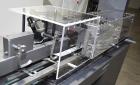 Used Bivans Vertuck Model 74 Semi Automatic Vertical Cartoner. Capable of speeds up to 120 CPM. Has 6