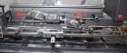 Used Bivans Vertuck Model 74 Semi Automatic Vertical Cartoner. Capable of speeds up to 120 CPM. Has 6