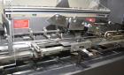 Used- Bivans Vertuck Model 74 Semi Automatic Vertical Cartoner. Capable of speeds up to 120 CPM. Has 6