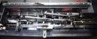 Used Bivans Vertuck Model 74 Semi Automatic Vertical Cartoner. Capable of speeds up to 120 CPM. Has 6