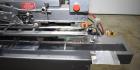 Used Bivans Vertuck Model 74 Semi Automatic Vertical Cartoner. Capable of speeds up to 120 CPM. Has 6