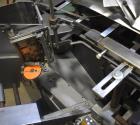 Used Bivans Vertuck Model 74 Semi Automatic Vertical Cartoner. Capable of speeds up to 120 CPM. Has 6