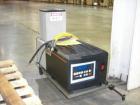 Used Bivans Vertical Top Glue Closer, Model 82. Capable of speeds up to 60 cartons per minute. Has a carton size range: Min length 7/8