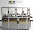 Used Bivans Model 82 Top Closer. Capable of speeds up to 60 cartons per minute. Has a carton size range: (Length) 7/8