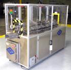 Used Bivans Model 82 Top Closer. Capable of speeds up to 60 cartons per minute. Has a carton size range: (Length) 7/8