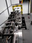 Used Bivans Model 82 Top Closer. Capable of speeds up to 60 cartons per minute. Has a carton size range: (Length) 7/8