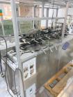Used Bivans Model 82 Top Closer Carton Sealer. Machine is capable of speeds from 5 to 60 cartons per minute. Has a carton size range of: 7/8