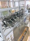 Used Bivans Model 82 Top Closer Carton Sealer. Machine is capable of speeds from 5 to 60 cartons per minute. Has a carton size range of: 7/8