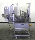 Used Brunner Model VC Reverse Tuck Vertical Intermittent Motion Cartoner.