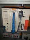 Used Brunner Model VC Reverse Tuck Vertical Intermittent Motion Cartoner.