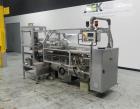 Used CAM Model AV Vertical Cartoner With Automatic Bottle Loader