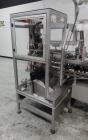 Used CAM Model AV Vertical Cartoner With Automatic Bottle Loader