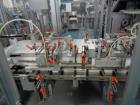 Used-Cariba Model C230 Automatic intermittant motion vertical cartoner with robotic loader for bottles/jars. Capable of spee...