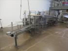 Used Clybourn Model CHL7 vertical hand load hot melt glue cartoner. Capable of speeds from 10 to 100 cartons per minute.  Set on 10