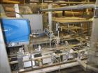 Used Clybourn Model CHL7 vertical hand load hot melt glue cartoner. Capable of speeds from 10 to 100 cartons per minute.  Set on 10