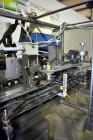 Used Jones Semi-Automatic Continuous Motion Vertical Hot Melt Glue Cartoner