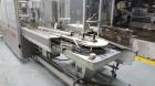 Used Jones CMV-5 Semi- Automatic Vertical Cartoner with bottle loader