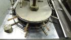 Used Jones CMV-5 Semi- Automatic Vertical Cartoner with bottle loader