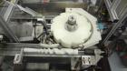 Used Jones CMV-5 Semi- Automatic Vertical Cartoner with bottle loader