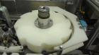 Used Jones CMV-5 Semi- Automatic Vertical Cartoner with bottle loader