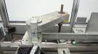Used Jones CMV-5 Semi- Automatic Vertical Cartoner with bottle loader