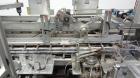 Used Jones CMV-5 Semi- Automatic Vertical Cartoner with bottle loader