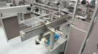 Used Jones CMV-5 Semi- Automatic Vertical Cartoner with bottle loader