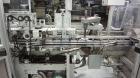 Used Jones CMV-5 Semi- Automatic Vertical Cartoner with bottle loader