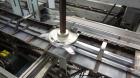 Used Jones CMV-5 Semi- Automatic Vertical Cartoner with bottle loader