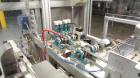 Used Jones CMV-5 Semi- Automatic Vertical Cartoner with bottle loader