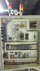 Used Jones CMV-5 Semi- Automatic Vertical Cartoner with bottle loader