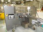 Used Jones CMV5 Semi Automatic Continuous Motion Vertical Tuck Cartoner. Capable of speeds up to 120 cpm. Has 5