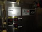 Used Jones CMV5 Semi Automatic Continuous Motion Vertical Tuck Cartoner. Capable of speeds up to 120 cpm. Has 5