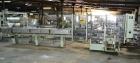 Used Jones Model CMV5 Semi-Automatic Tuck Vertical Cartoner. Machine is capable of speeds up to 120 cartons per minute. Has manual load station of 8' (both sides). Has 5