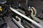 Used Jones Model CMV5 Semi-Automatic Tuck Vertical Cartoner. Machine is capable of speeds up to 120 cartons per minute. Has manual load station of 8' (both sides). Has 5