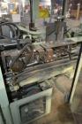 Used Jones Model CMV5 Semi-Automatic Tuck Vertical Cartoner. Machine is capable of speeds up to 120 cartons per minute. Has manual load station of 8' (both sides). Has 5
