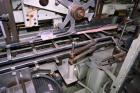 Used Jones Model CMV5 Semi-Automatic Tuck Vertical Cartoner. Machine is capable of speeds up to 120 cartons per minute. Has manual load station of 8' (both sides). Has 5