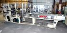 Used Jones Model CMV5 Semi-Automatic Tuck Vertical Cartoner. Machine is capable of speeds up to 120 cartons per minute. Has manual load station of 8' (both sides). Has 5