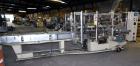 Used Jones Model CMV5 Semi-Automatic Tuck Vertical Cartoner. Machine is capable of speeds up to 120 cartons per minute. Has manual load station of 8' (both sides). Has 5