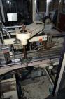 Used Jones Model CMV5 Semi-Automatic Tuck Vertical Cartoner. Machine is capable of speeds up to 120 cartons per minute. Has manual load station of 8' (both sides). Has 5