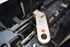 Used Jones Model CMV5 Semi-Automatic Tuck Vertical Cartoner. Machine is capable of speeds up to 120 cartons per minute. Has manual load station of 8' (both sides). Has 5