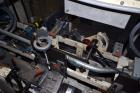 Used Jones Model CMV5 Semi-Automatic Tuck Vertical Cartoner. Machine is capable of speeds up to 120 cartons per minute. Has manual load station of 8' (both sides). Has 5