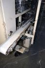 Used Jones Model CMV5 Semi-Automatic Tuck Vertical Cartoner. Machine is capable of speeds up to 120 cartons per minute. Has manual load station of 8' (both sides). Has 5