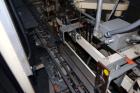 Used Jones Model CMV5 Semi-Automatic Tuck Vertical Cartoner. Machine is capable of speeds up to 120 cartons per minute. Has manual load station of 8' (both sides). Has 5