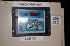 Used Jones Model CMV5 Semi-Automatic Tuck Vertical Cartoner. Machine is capable of speeds up to 120 cartons per minute. Has manual load station of 8' (both sides). Has 5