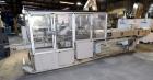 Used Jones Model CMV5 Semi-Automatic Tuck Vertical Cartoner. Machine is capable of speeds up to 120 cartons per minute. Has manual load station of 8' (both sides). Has 5