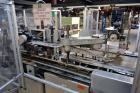 Used Jones Model CMV5 Semi-Automatic Tuck Vertical Cartoner. Machine is capable of speeds up to 120 cartons per minute. Has manual load station of 8' (both sides). Has 5